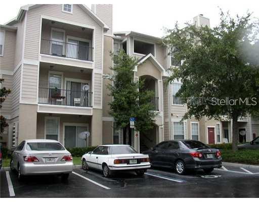 2000 Erving Circle, Unit 108 Ocoee, FL 34761 - Photo 1 of 1 a car parked in front of a house