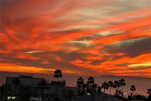 a view of outdoor space and front view of a house