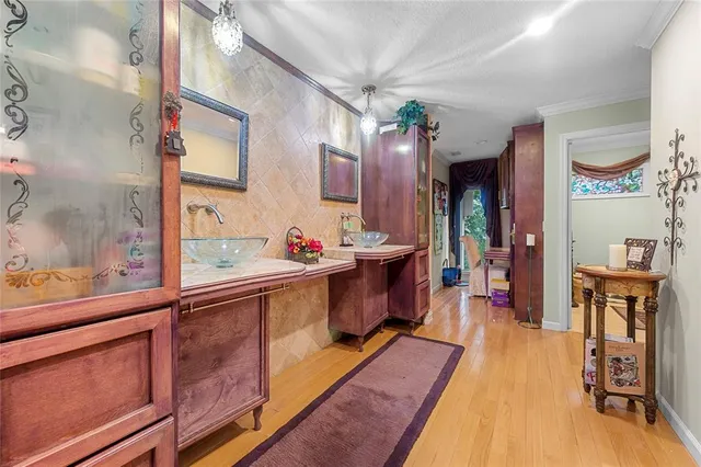 a large bathroom with a sink and a mirror