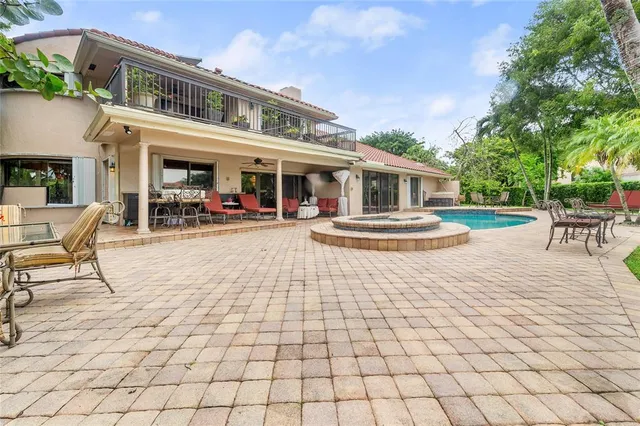 a aerial view of a house with a yard