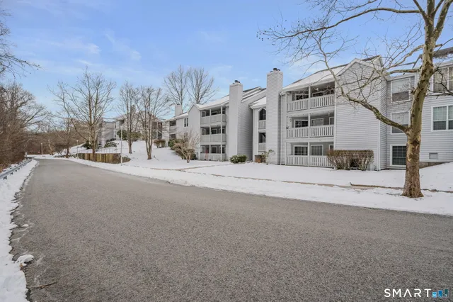 a view of a building with a road