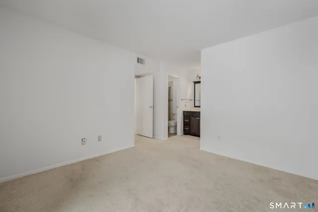 a view of a kitchen with an empty space