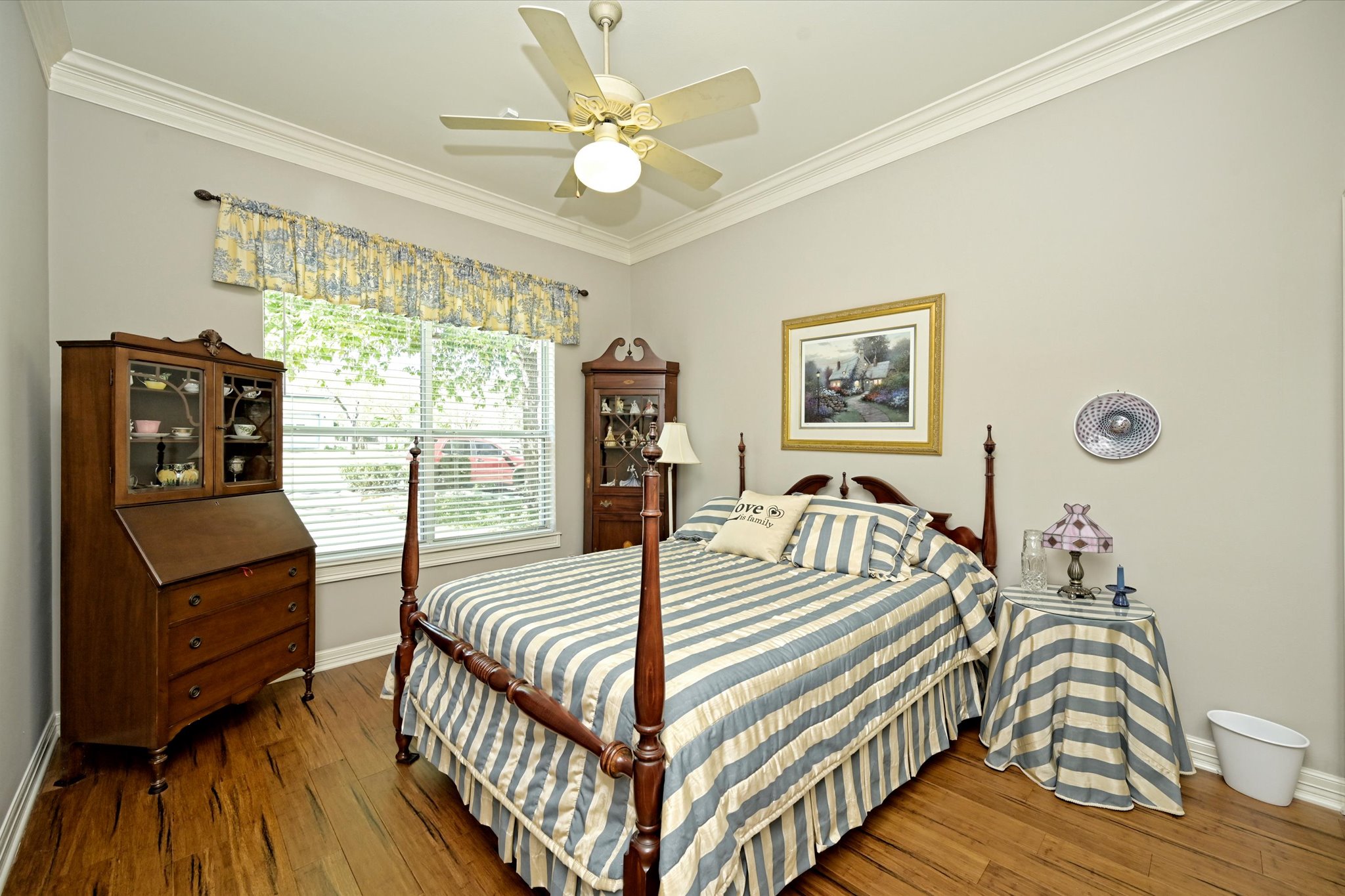 4912 Interlachen Lane Austin, TX 78747 - Photo 19 of 39 a bedroom with a bed and a table