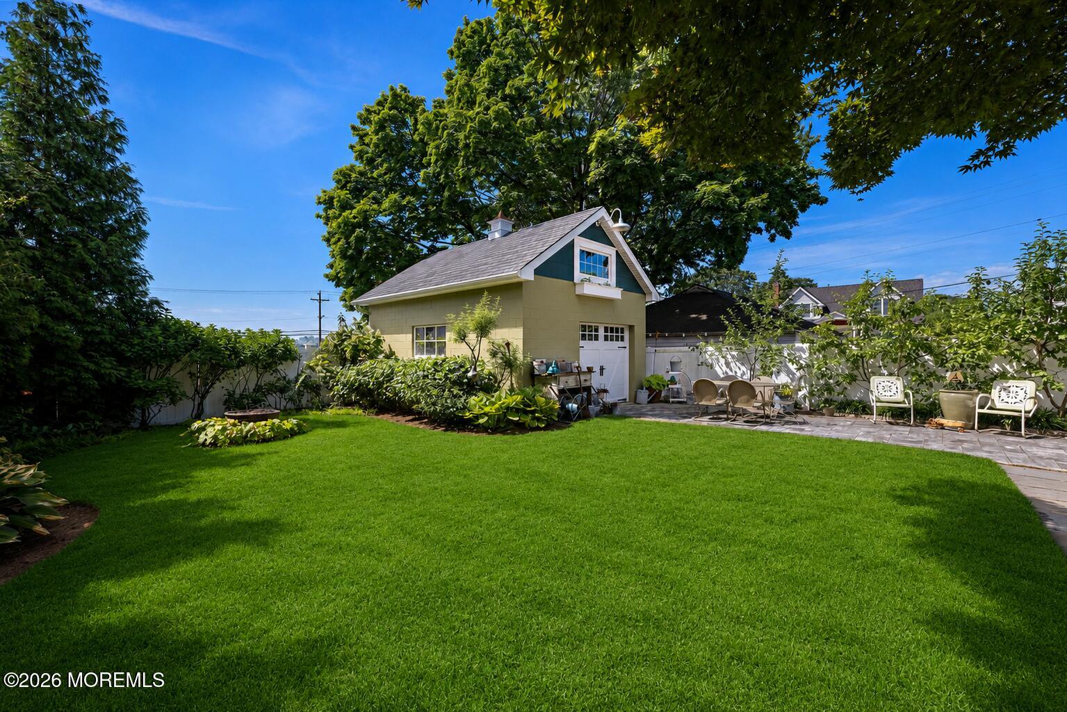 69 Foster Street Red Bank, NJ 07701 - Photo 42 of 56 backyard/garage-grass virtually enhanced