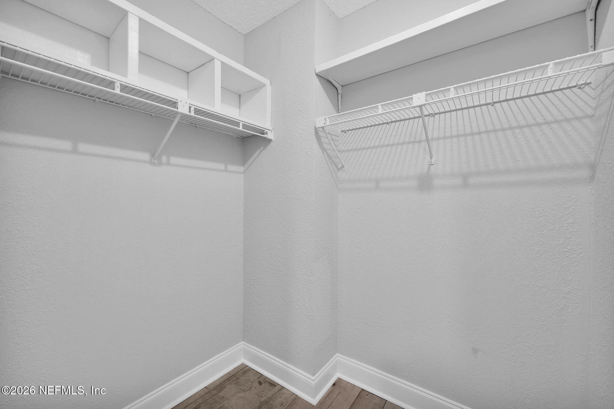 2494 Spring Vale Road Jacksonville, FL 32246 - Photo 22 of 36 a view of an empty walk in closet