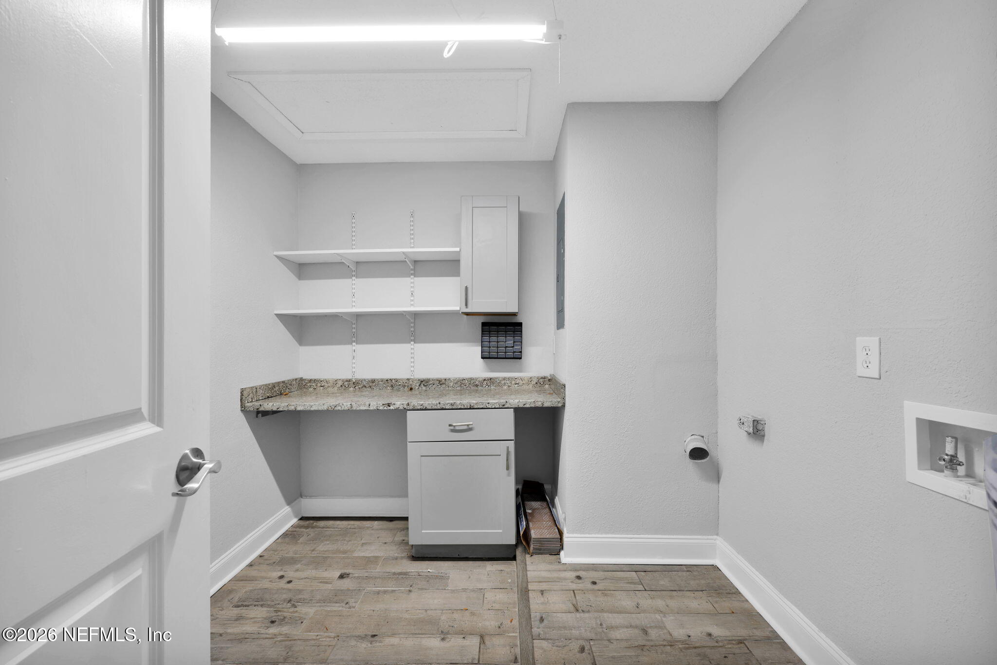 2494 Spring Vale Road Jacksonville, FL 32246 - Photo 25 of 36 a room with a stove and a sink