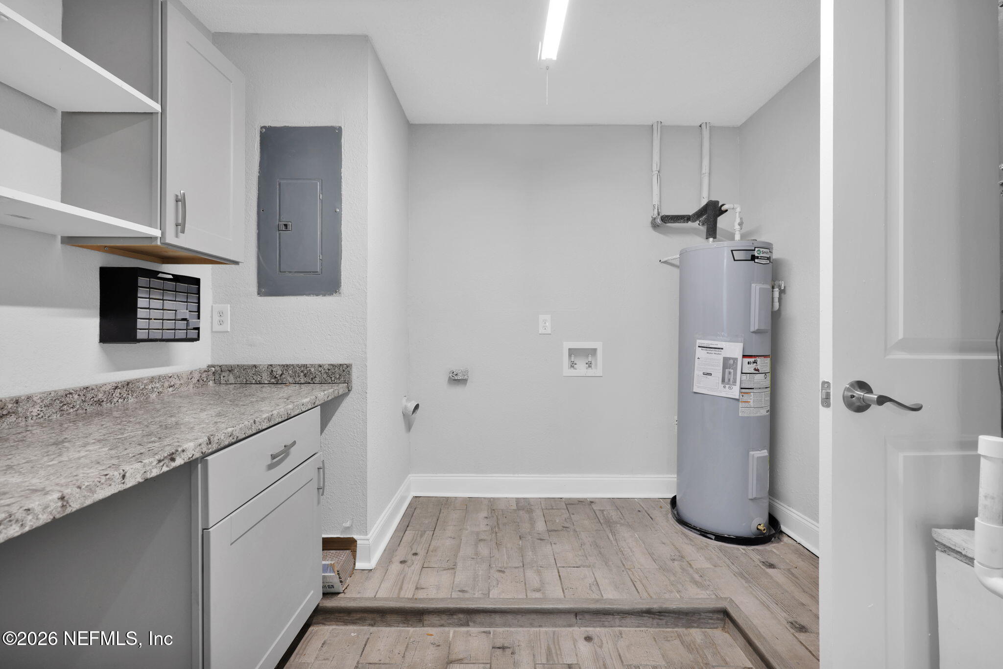 2494 Spring Vale Road Jacksonville, FL 32246 - Photo 26 of 36 a bathroom with a granite countertop shower a sink and a mirror