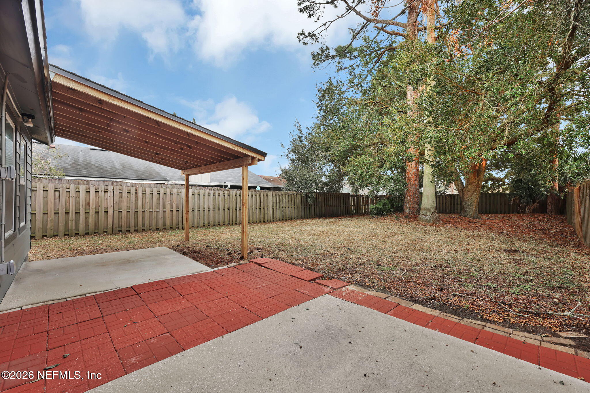 2494 Spring Vale Road Jacksonville, FL 32246 - Photo 29 of 36 a backyard of a house