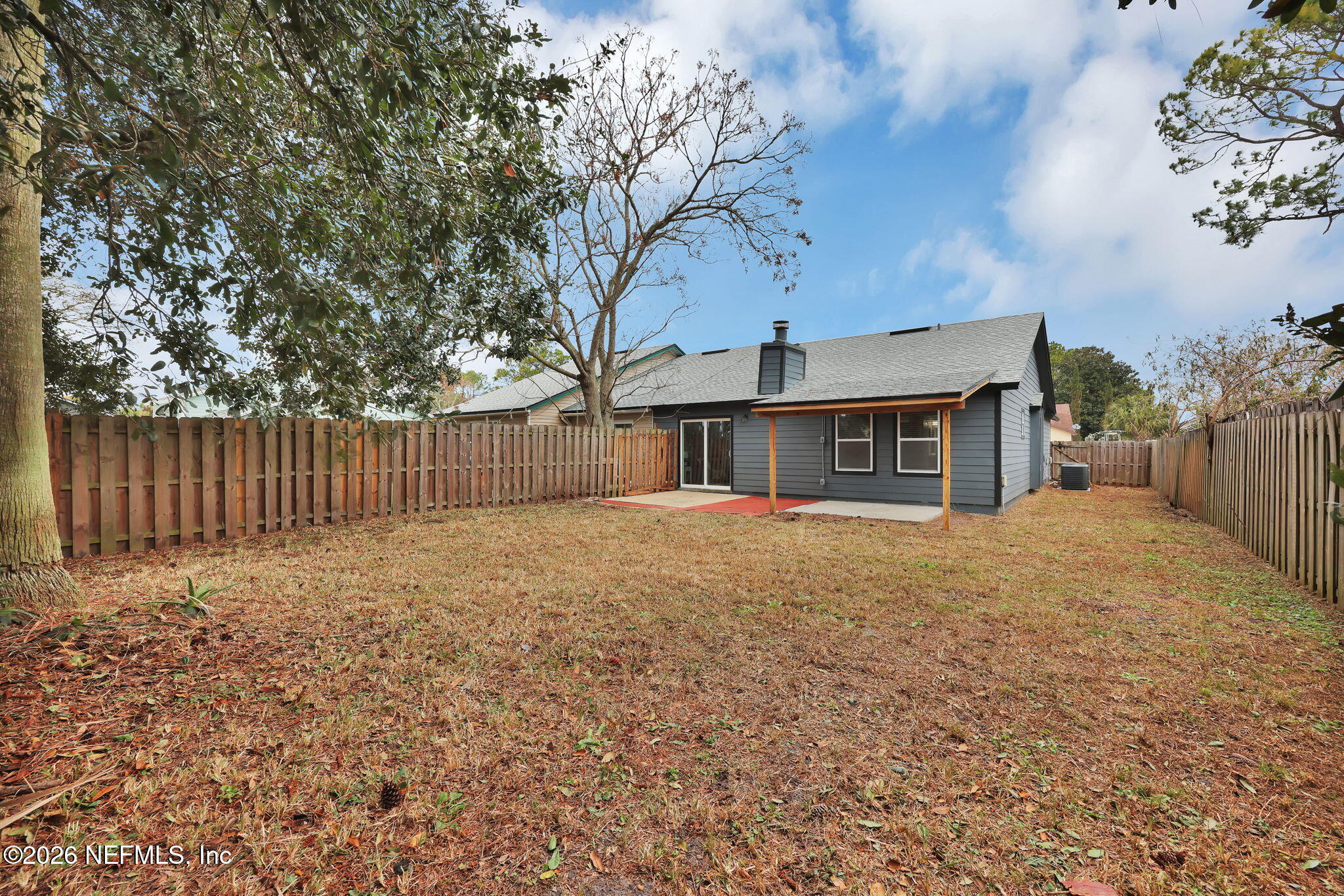 2494 Spring Vale Road Jacksonville, FL 32246 - Photo 35 of 36 a backyard of a house