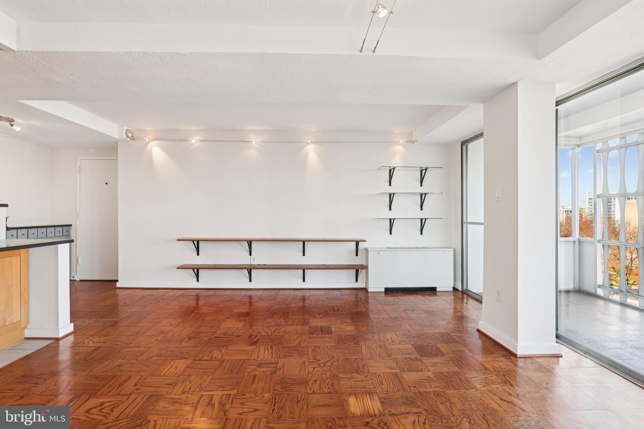 1301 Delaware Avenue Southwest Washington, DC 20024 - Photo 16 of 73 Spacious, sunlit room with modern elegance.