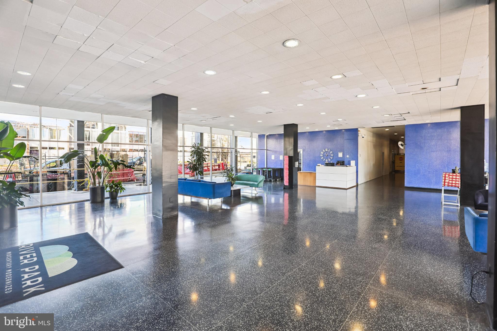 1301 Delaware Avenue Southwest Washington, DC 20024 - Photo 42 of 73 Modern lobby with vibrant decor and greenery.