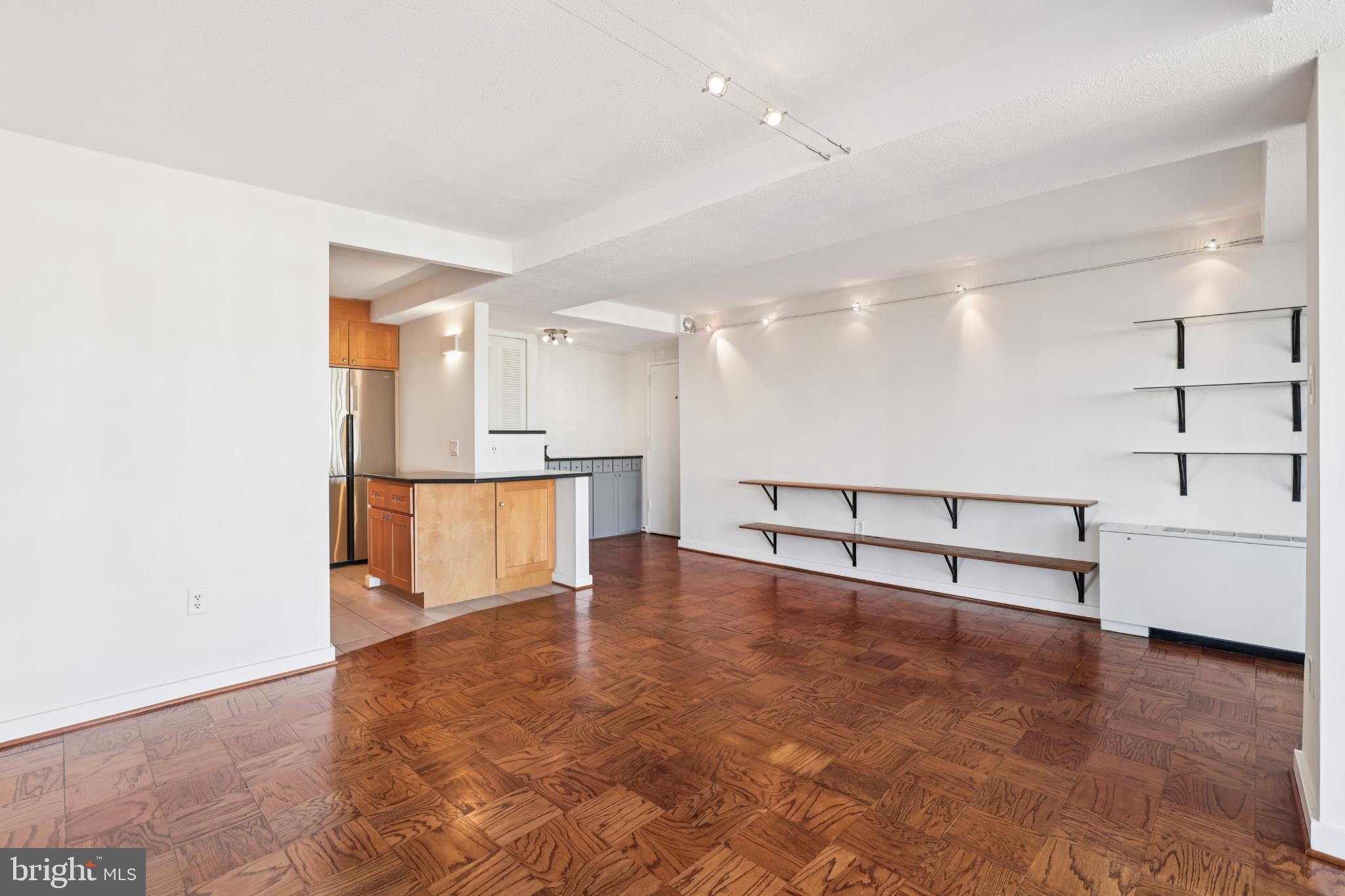 1301 Delaware Avenue Southwest Washington, DC 20024 - Photo 9 of 73 Spacious, sunlit living area with modern flair.