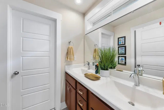 a view of a wooden chairs on deck