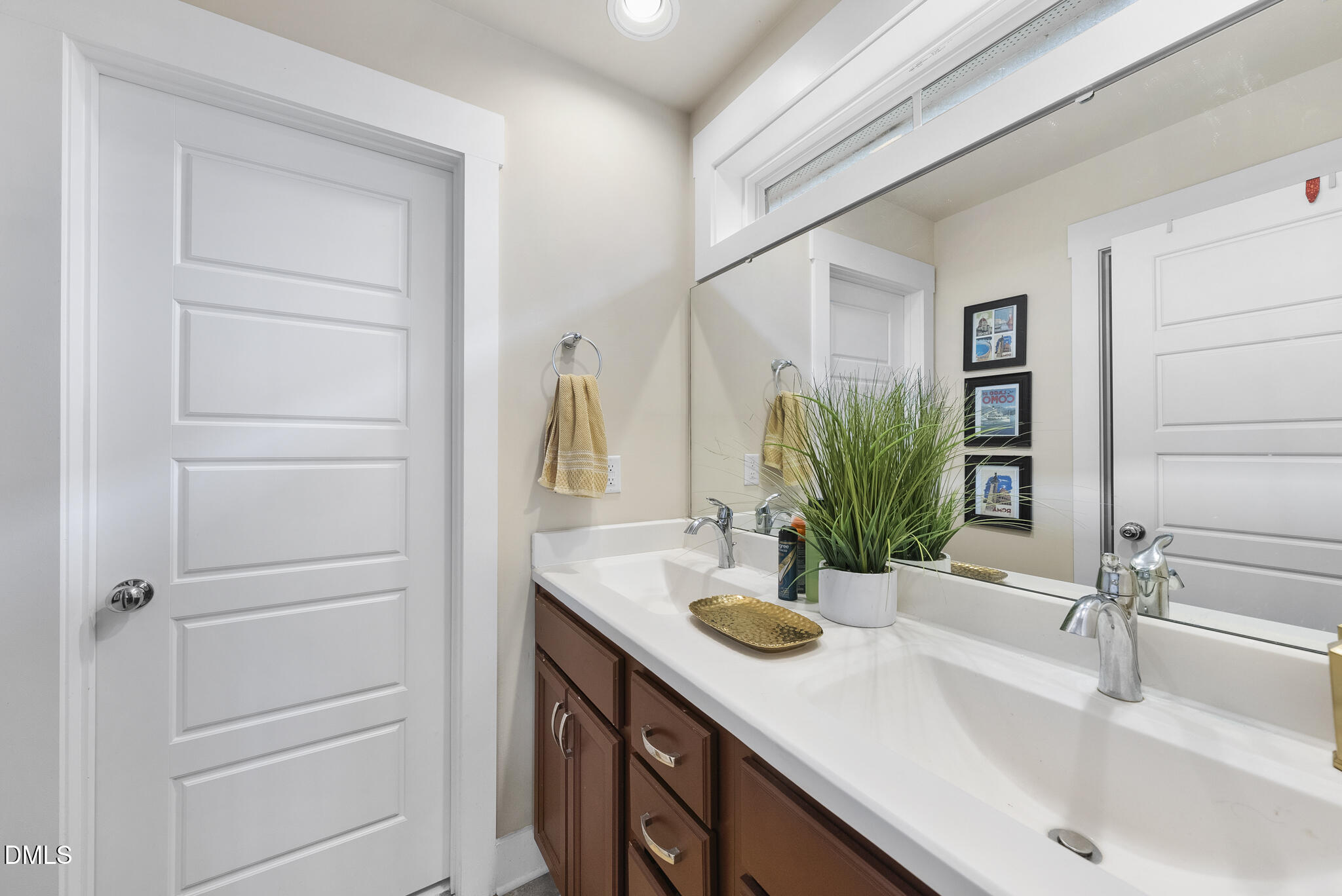 1985 Big Falls Drive Wendell, NC 27591 - Photo 17 of 24 a bathroom with a sink and a mirror