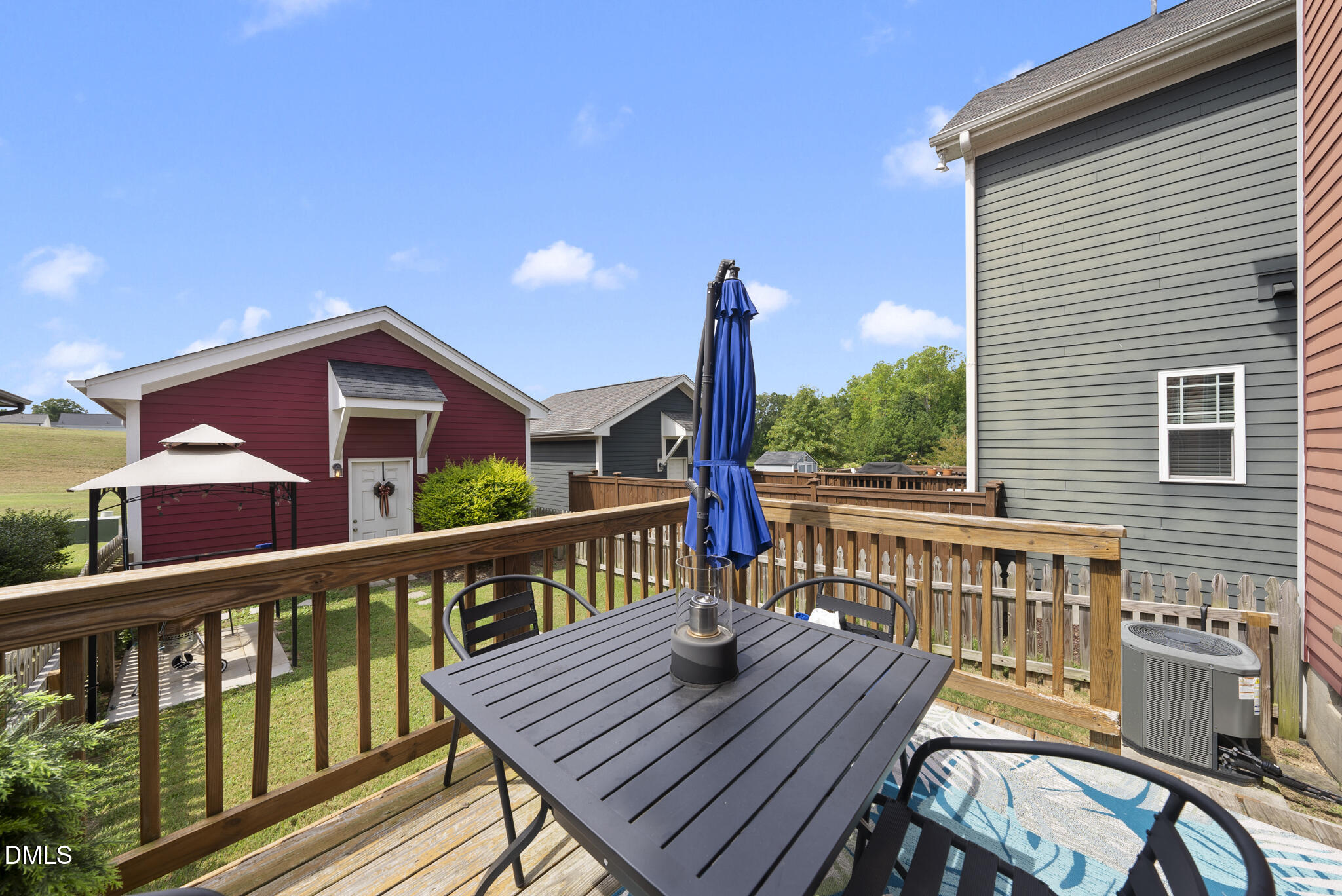 1985 Big Falls Drive Wendell, NC 27591 - Photo 20 of 24 a view of a wooden chairs on deck