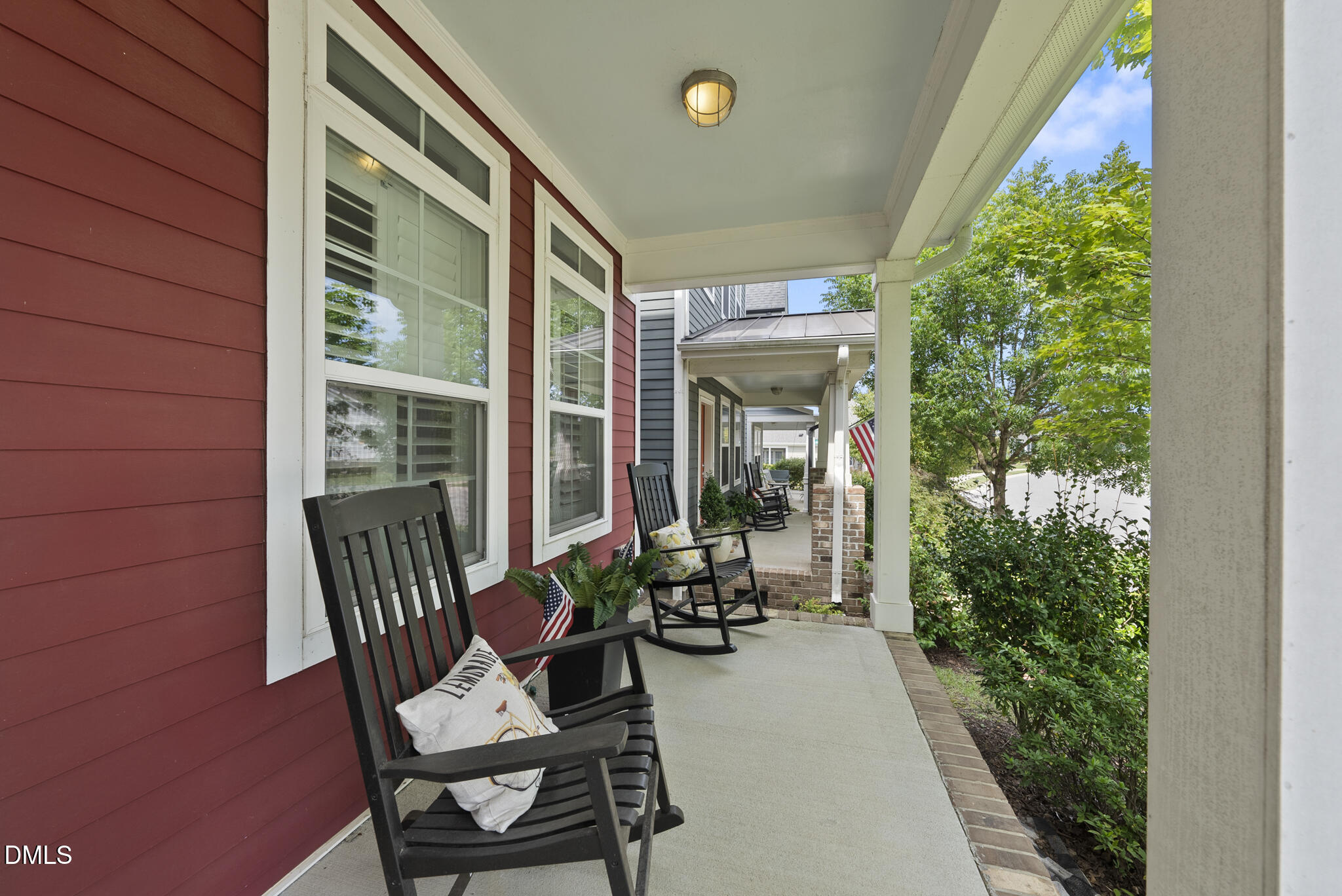 1985 Big Falls Drive Wendell, NC 27591 - Photo 22 of 24 a view of a porch with chairs and potted plants