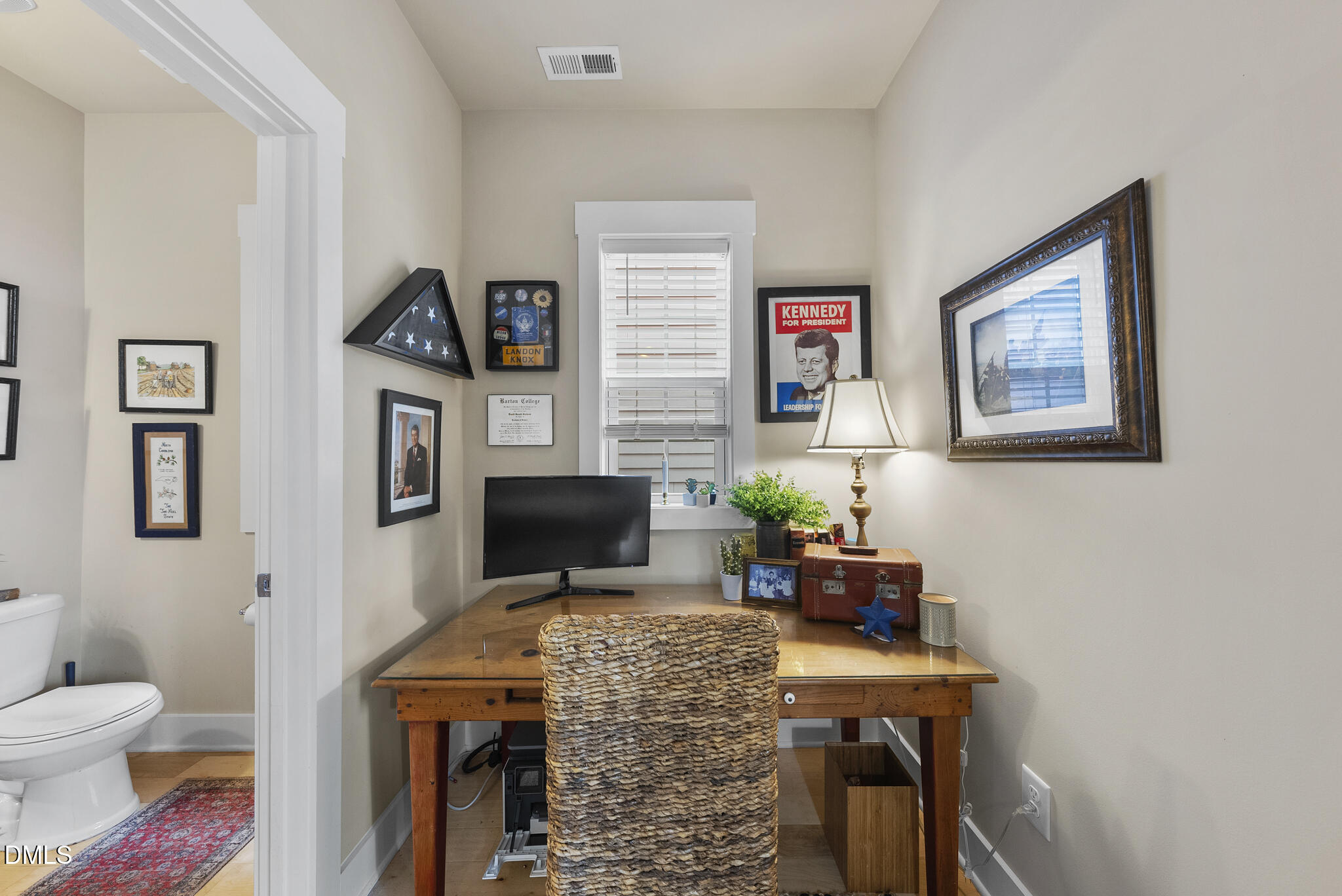 1985 Big Falls Drive Wendell, NC 27591 - Photo 6 of 24 a living room with furniture a flat screen tv and a fireplace
