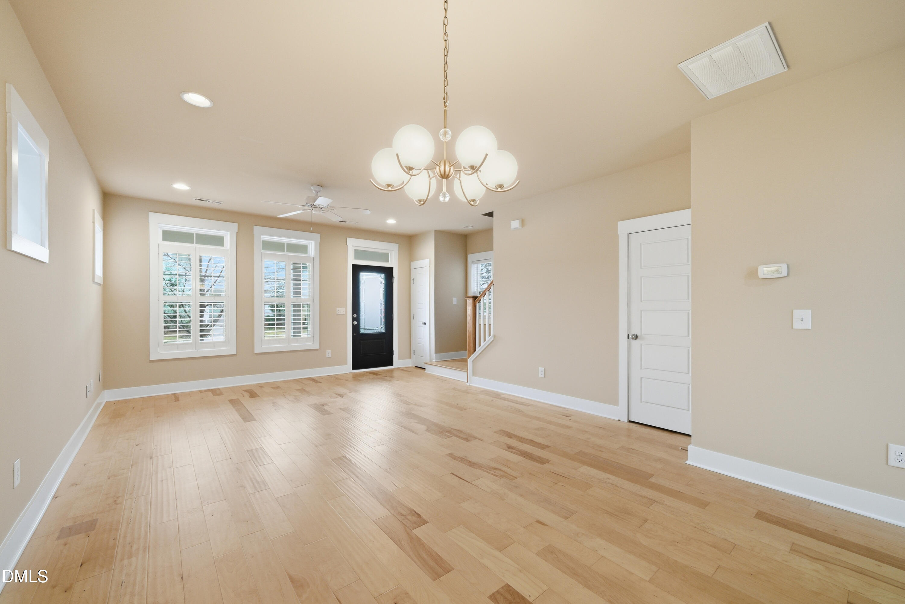 1985 Big Falls Drive Wendell, NC 27591 - Photo 10 of 24 a view of an empty room with a window and wooden floor