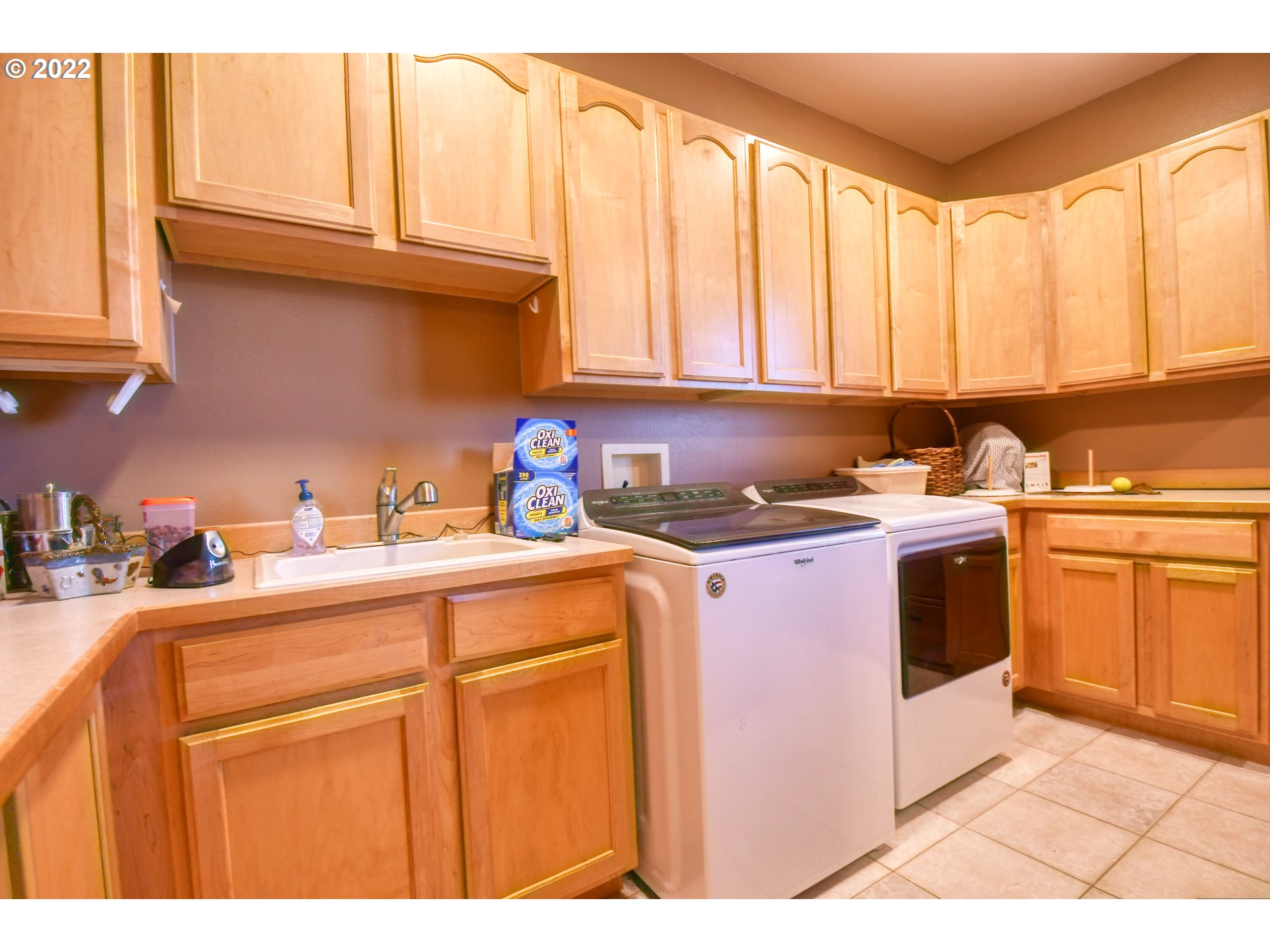 48903 Cayuse Road Pendleton, OR 97801 - Photo 25 of 32 a kitchen with stainless steel appliances granite countertop a sink a stove cabinets and a window