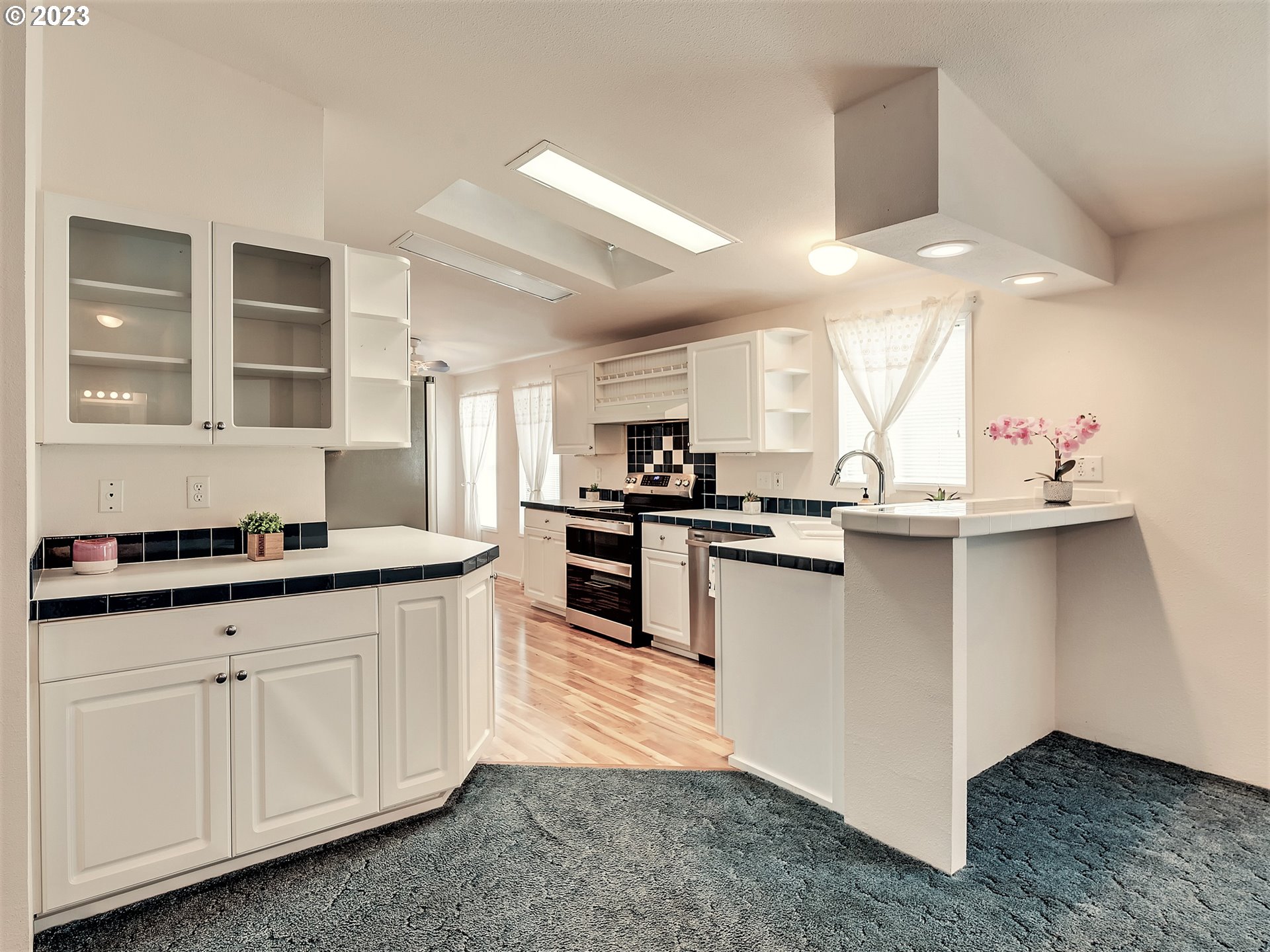 2267 Maia Loop Springfield, OR 97477 - Photo 4 of 15 a kitchen with granite countertop a sink and cabinets