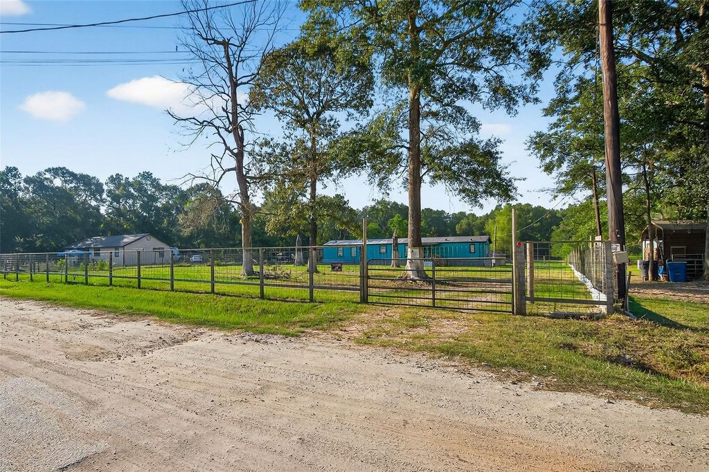 451 Trails End Drive Cleveland, TX 77328 - Photo 21 of 28 a view of a park