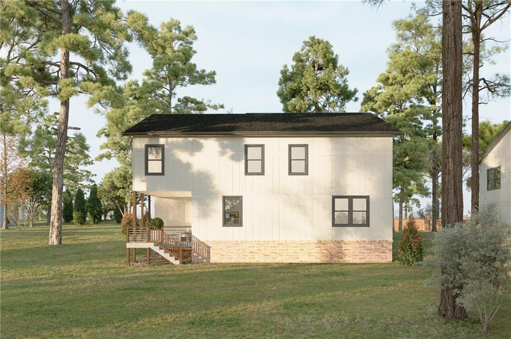 2303 Whites Mill Road Decatur, GA 30032 - Photo 2 of 6 a front view of a house with a yard