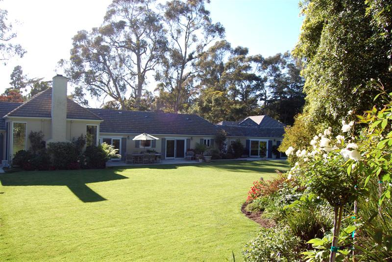 150 Middle Road Montecito, CA 93108 - Photo 10 of 12 a front view of a house with a yard and trees