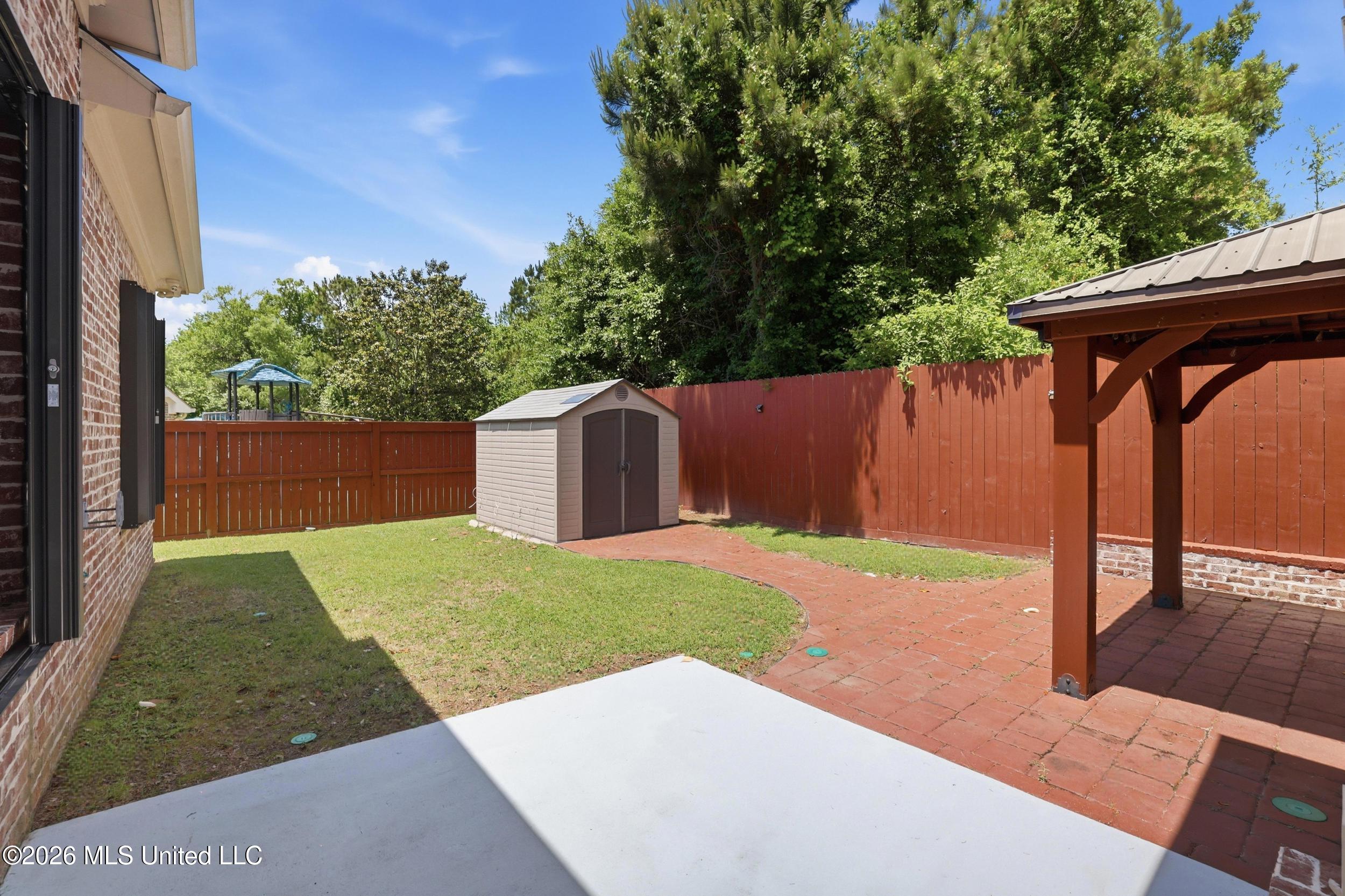 1584 Lucius Street Biloxi, MS 39532 - Photo 12 of 47 METAL STORAGE SHED