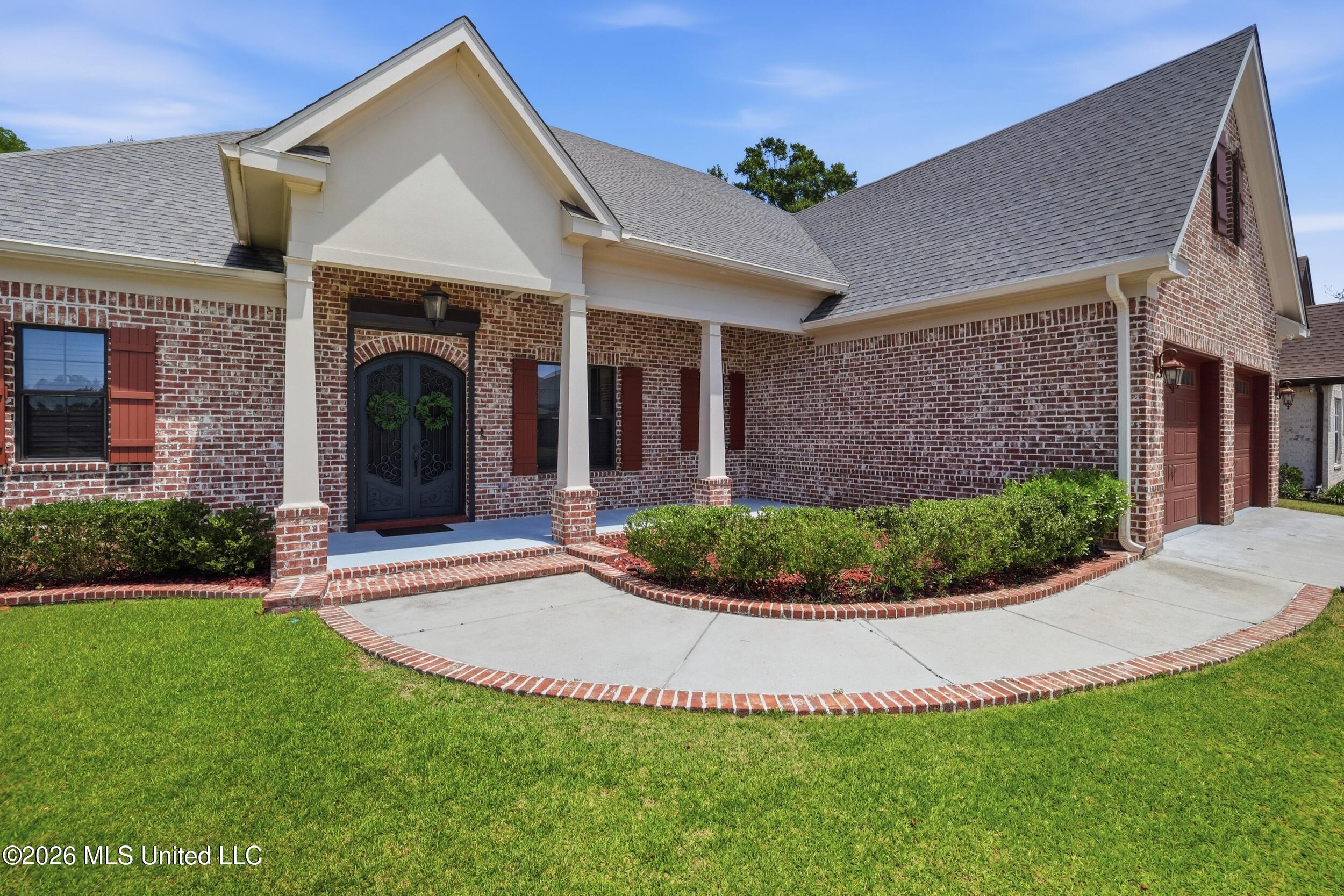 1584 Lucius Street Biloxi, MS 39532 - Photo 2 of 47 BRICK ACCENT EXTERIOR PATH WAY MAIN ENRR