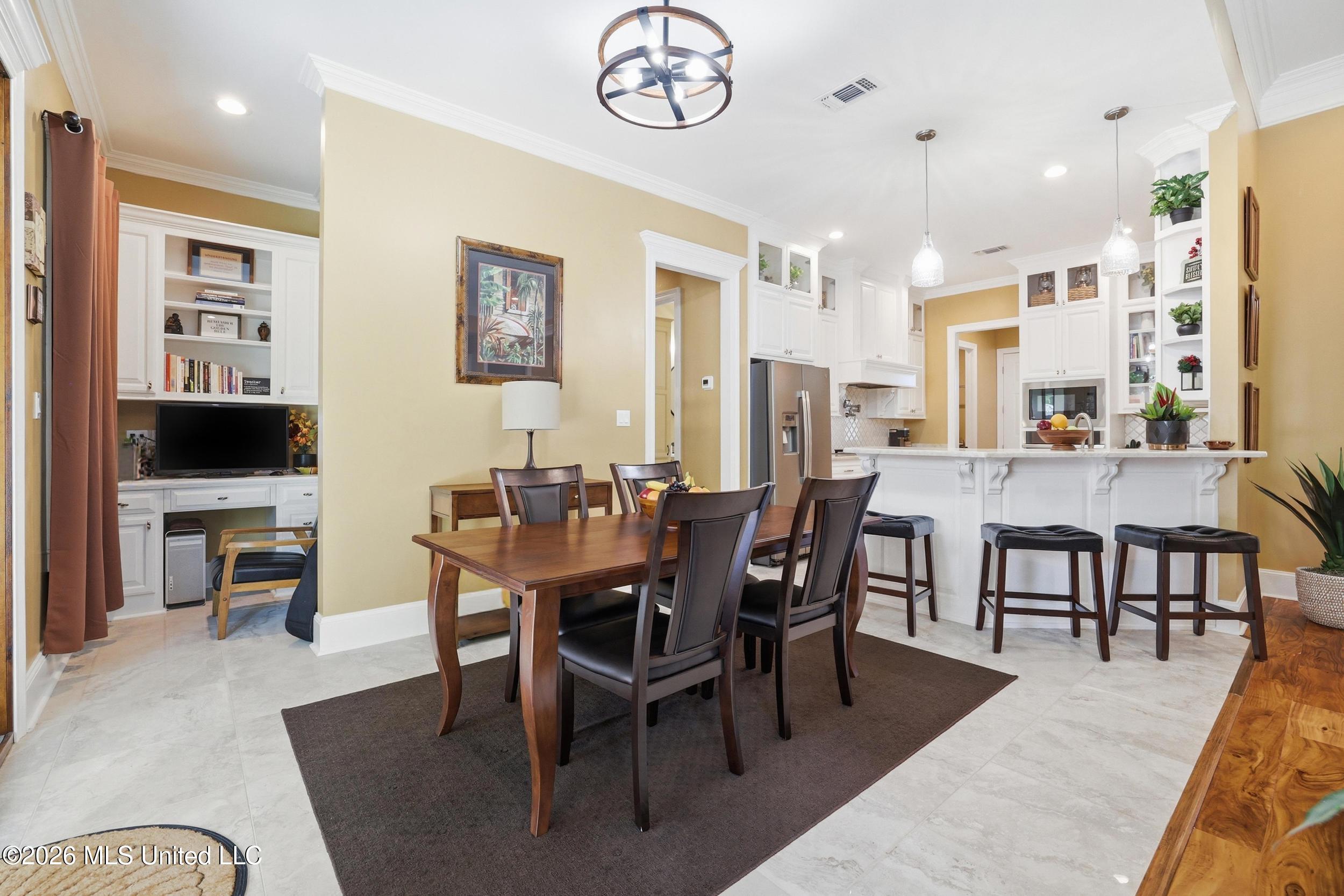 1584 Lucius Street Biloxi, MS 39532 - Photo 23 of 47 KITCHEN AND DINING AREA