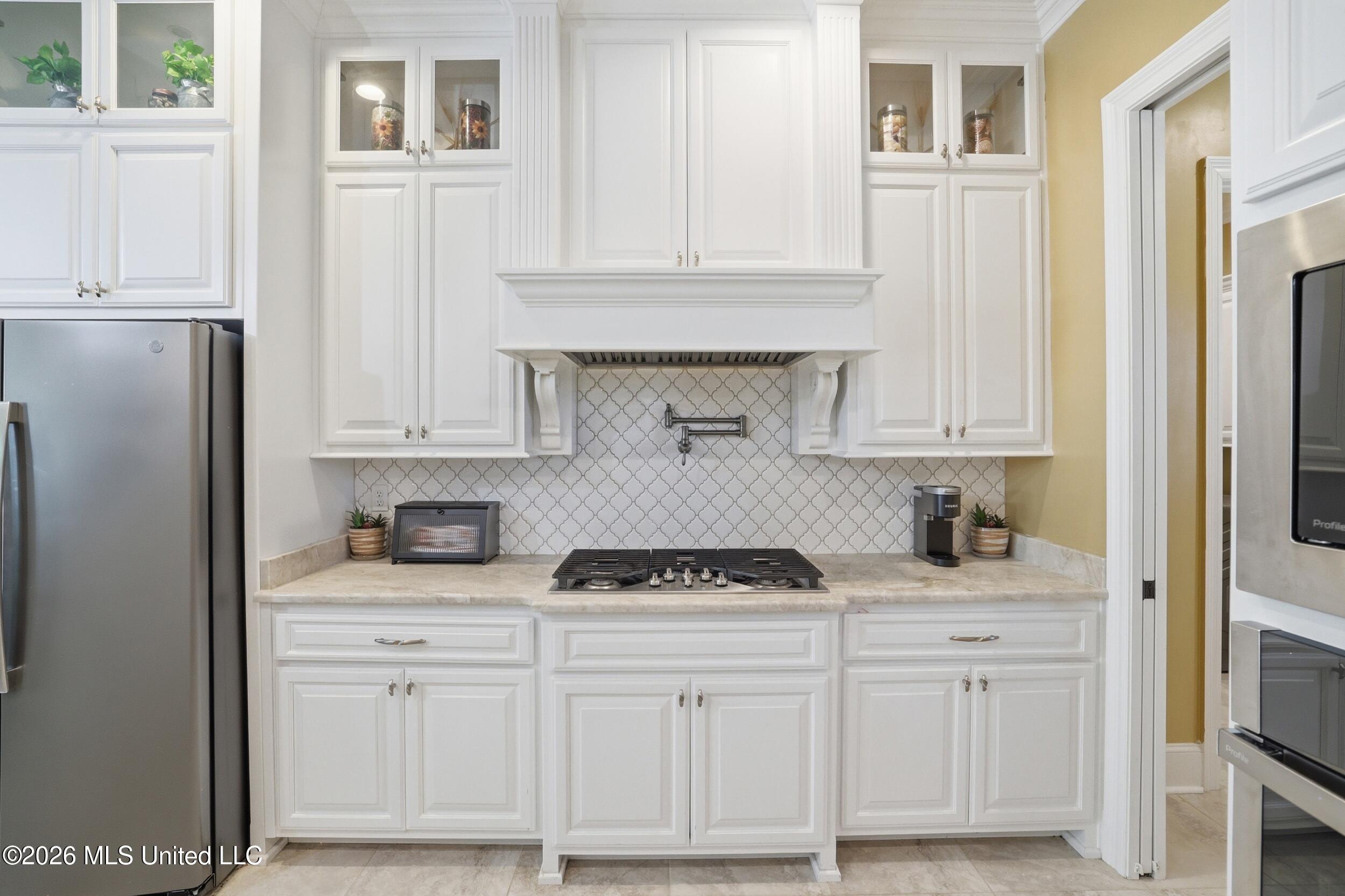 1584 Lucius Street Biloxi, MS 39532 - Photo 27 of 47 GORGEOUS KITCHEN WALL BACK SPLASH.