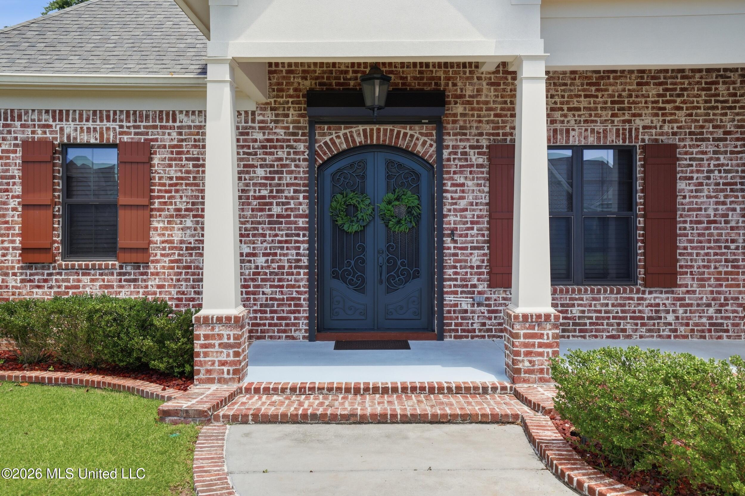1584 Lucius Street Biloxi, MS 39532 - Photo 3 of 47 DOBLE FRONT DOOR STORM SHUTTER