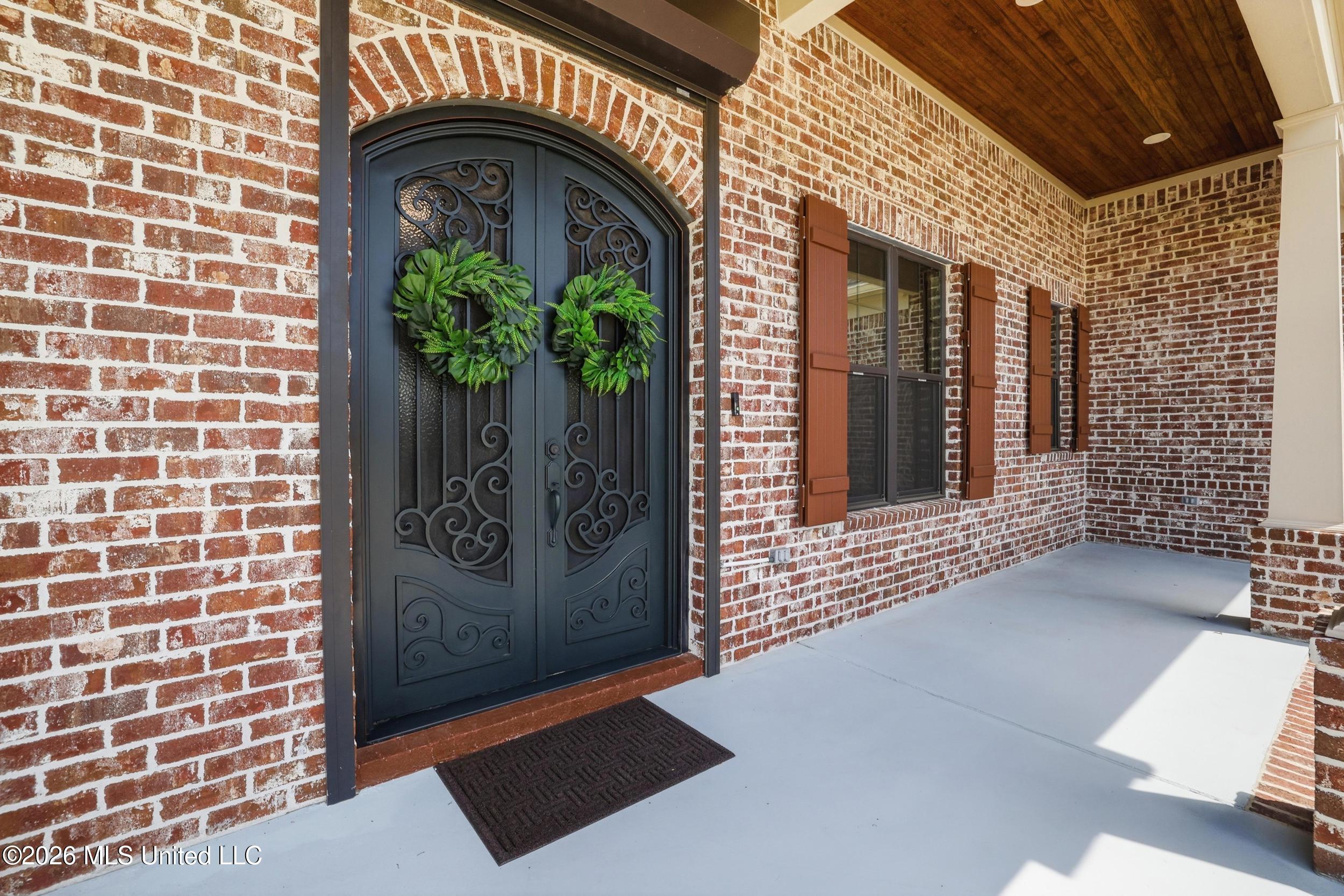 1584 Lucius Street Biloxi, MS 39532 - Photo 4 of 47 WROUGHT IRON DOBLE FRONT DOOR