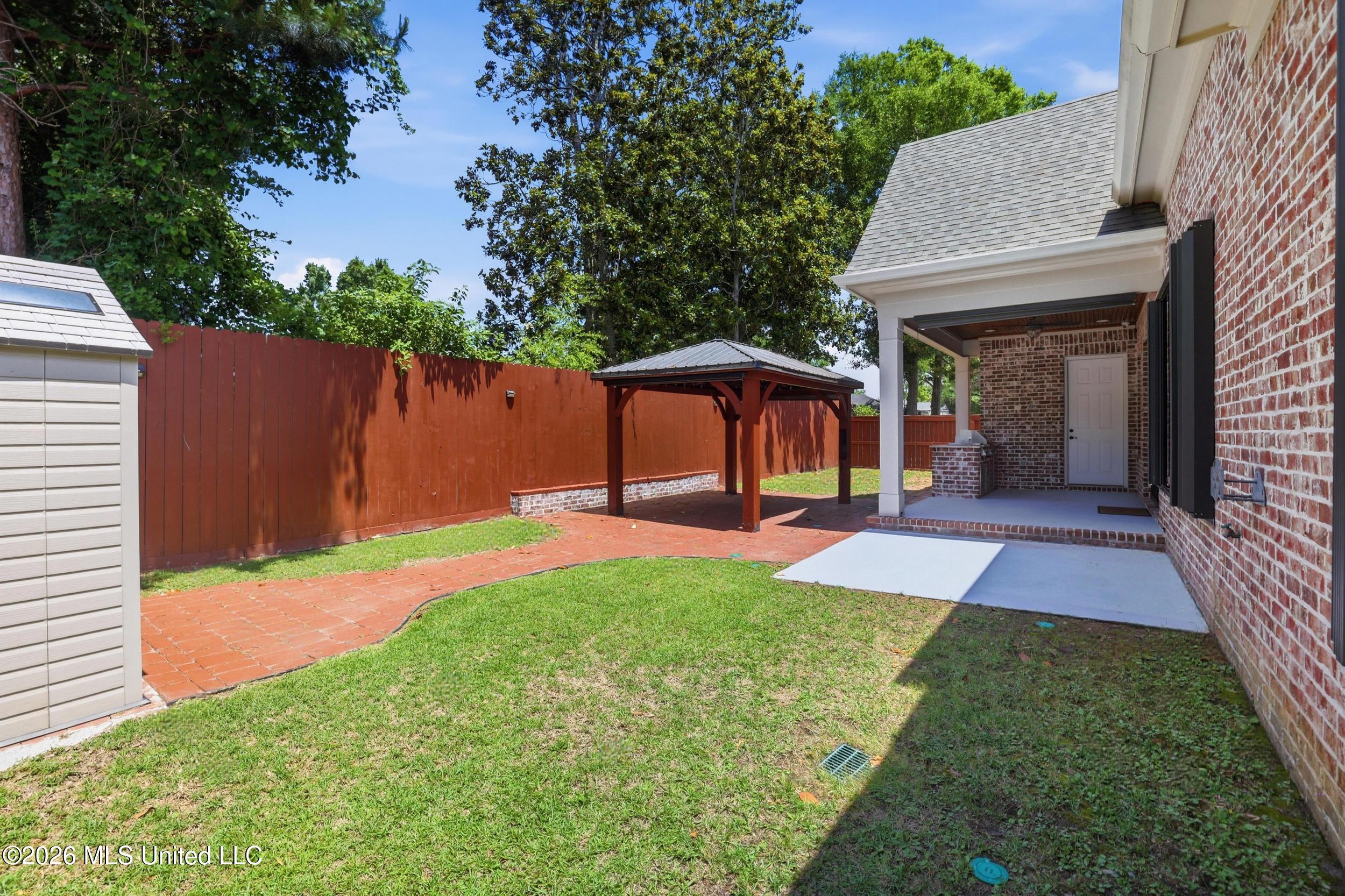 1584 Lucius Street Biloxi, MS 39532 - Photo 10 of 47 8 FOOT TALL WOOD FENCE.