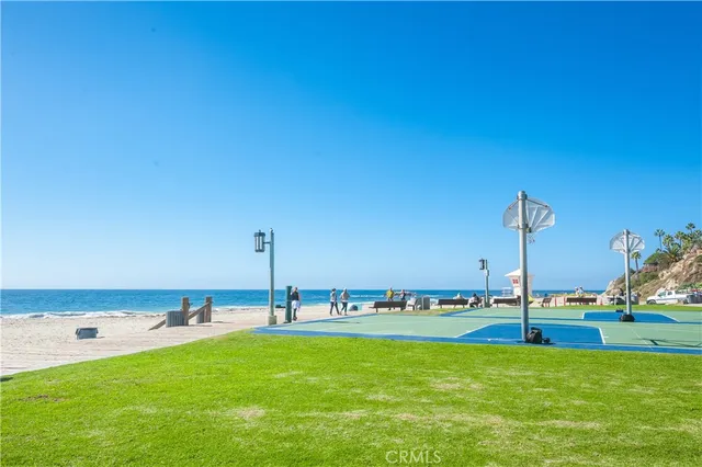 a view of a swimming pool and an ocean view