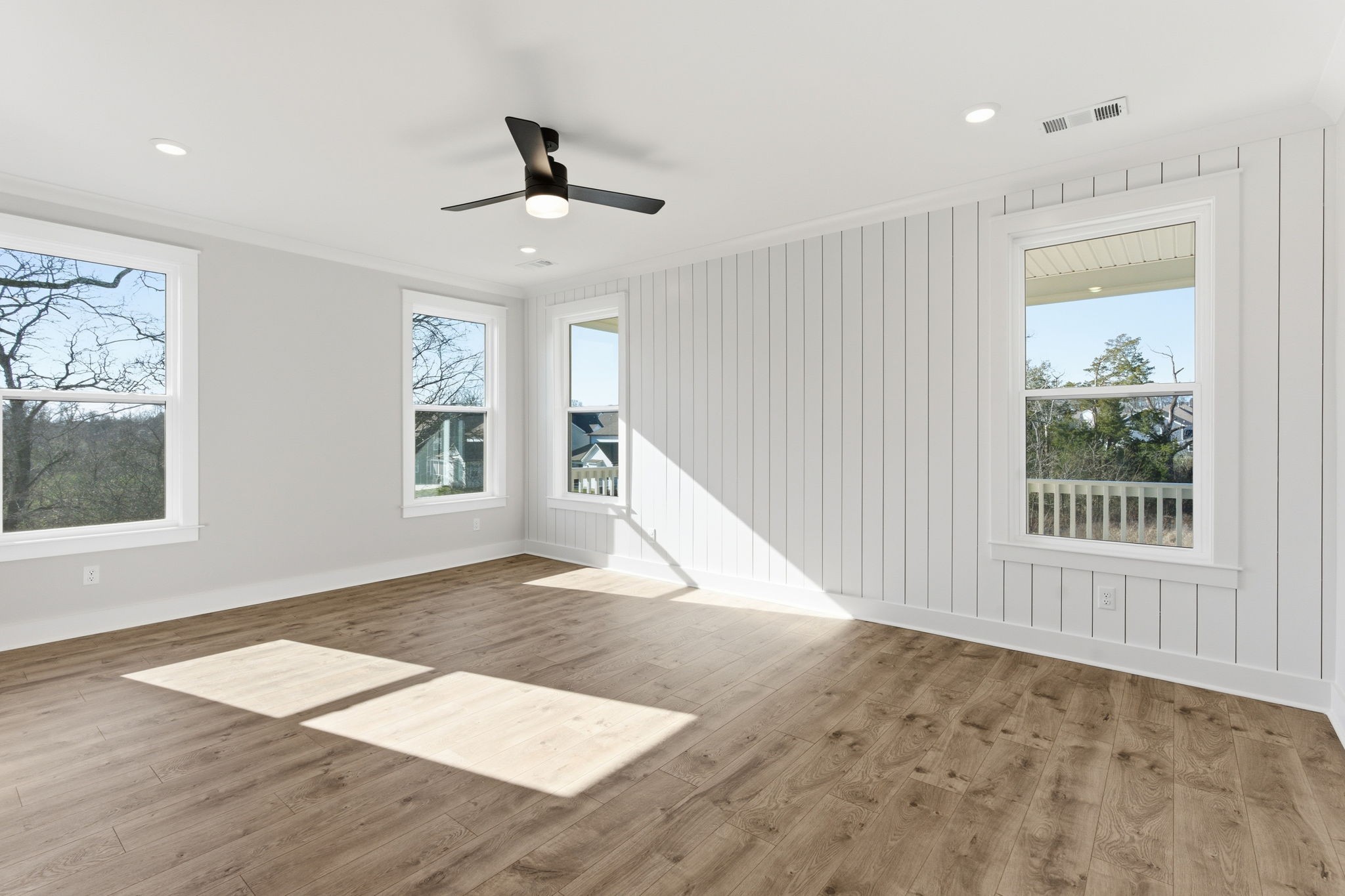 814 Sugarbush Lane Spring Hill, TN 37174 - Photo 37 of 80 a view of an empty room with wooden floor and a window