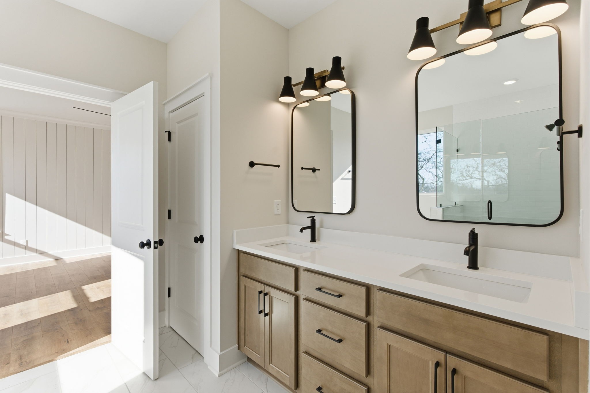 814 Sugarbush Lane Spring Hill, TN 37174 - Photo 44 of 80 a bathroom with double vanity sinks and a mirror