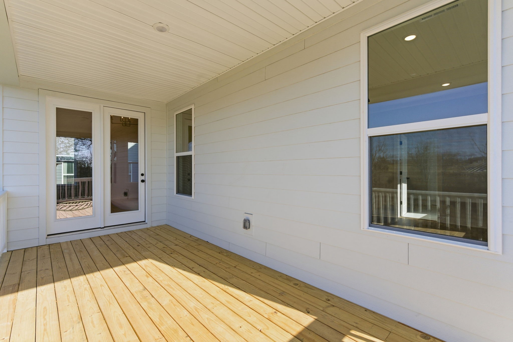 814 Sugarbush Lane Spring Hill, TN 37174 - Photo 78 of 80 a view of a room with wooden floor and door