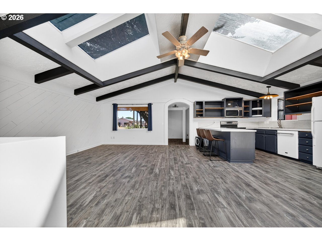 1260 Jackson Avenue Southwest Bandon, OR 97411 - Photo 19 of 48 a view of a kitchen with a sink cabinets and wooden floor