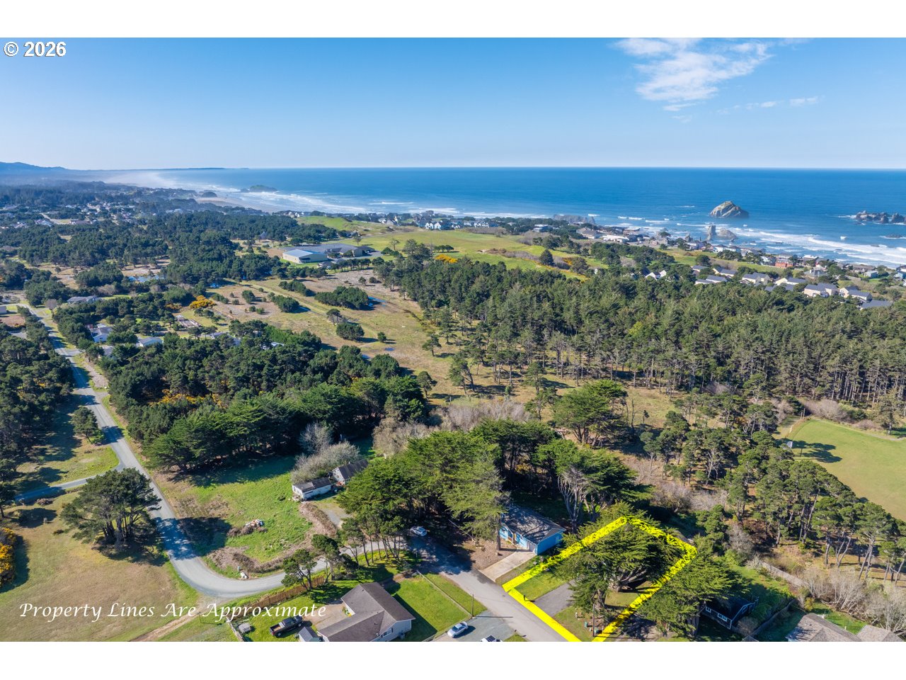 1260 Jackson Avenue Southwest Bandon, OR 97411 - Photo 39 of 48 an aerial view of residential building and green space
