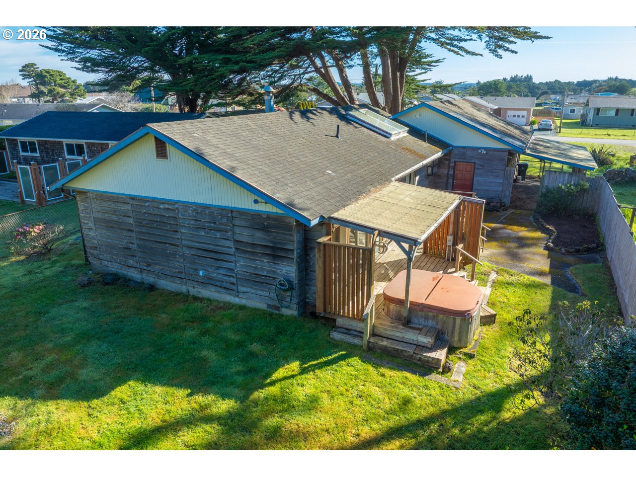 1260 Jackson Avenue Southwest Bandon, OR 97411 - Photo 44 of 48 a aerial view of a house with a yard