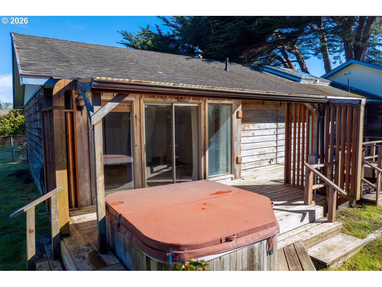 1260 Jackson Avenue Southwest Bandon, OR 97411 - Photo 45 of 48 a view of a house with backyard and sitting area