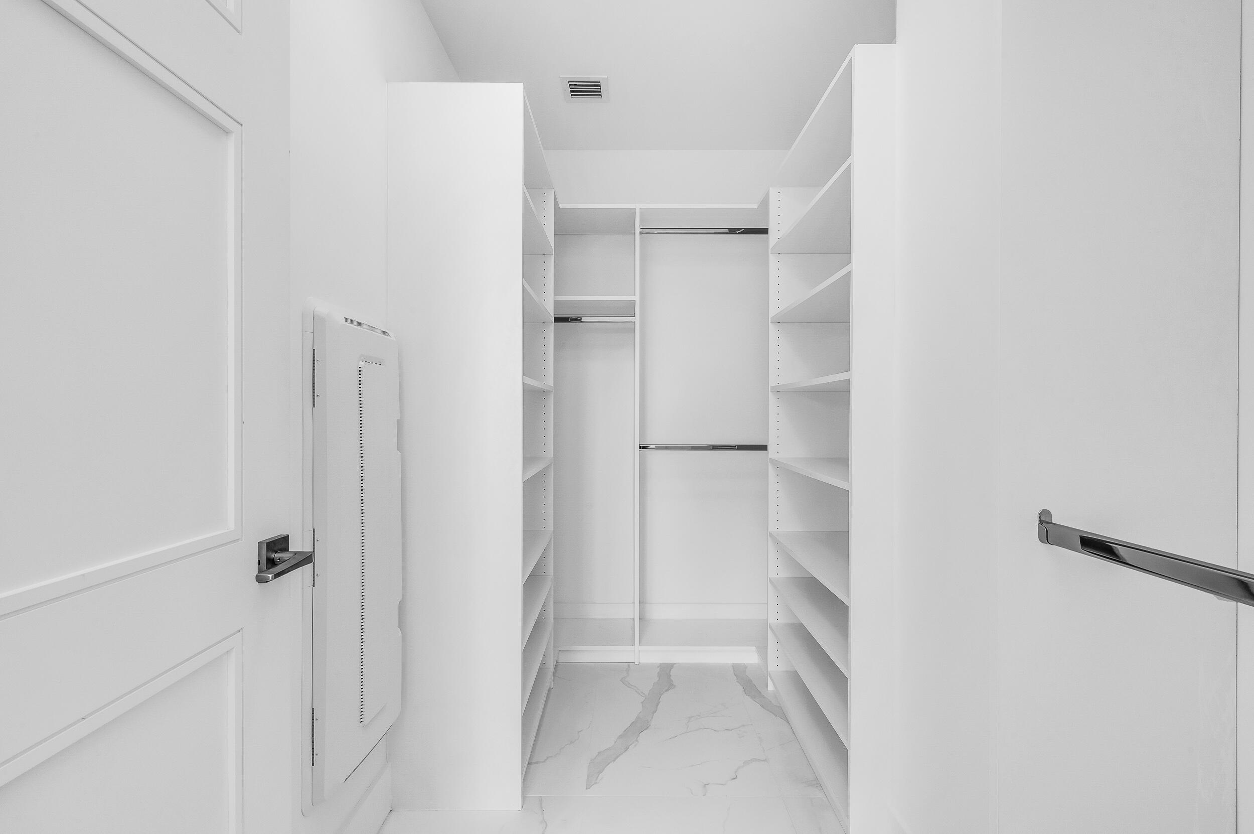 155 East Boca Raton Road, Unit 303 Boca Raton, FL 33432 - Photo 19 of 38 a view of a walk in closet