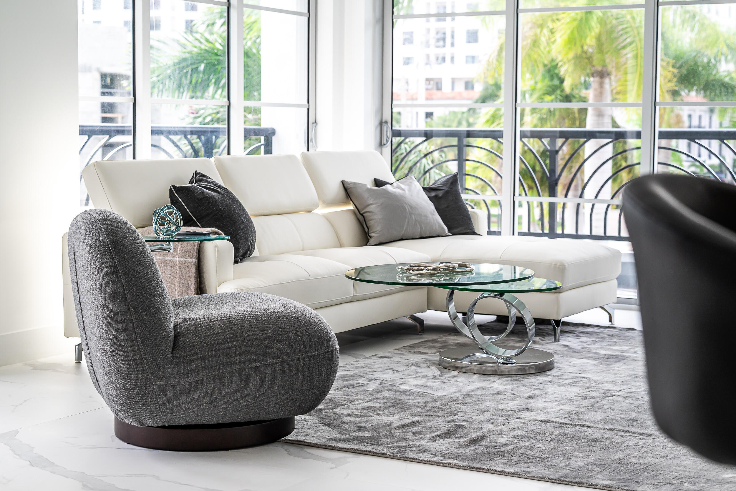 155 East Boca Raton Road, Unit 303 Boca Raton, FL 33432 - Photo 7 of 38 a living room with furniture and a large window