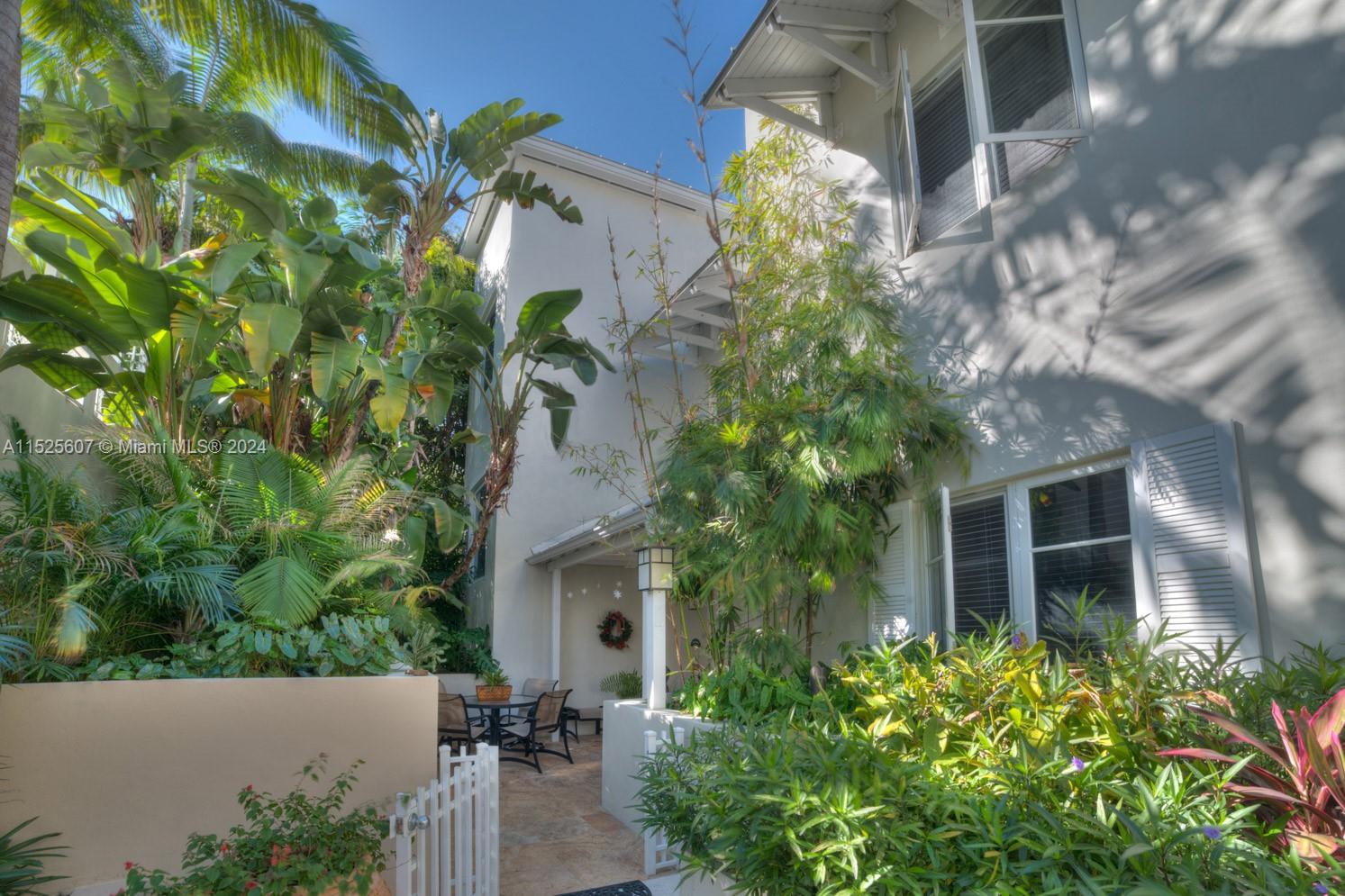 3540 Main Highway, Unit 305 Miami, FL 33133 - Photo 11 of 14 a view of a garden with plants