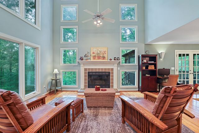 a dining room with a table and chairs