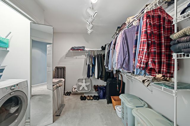 a bathroom with a sink double vanity and a mirror