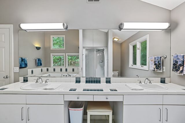 a view of balcony with wooden floor