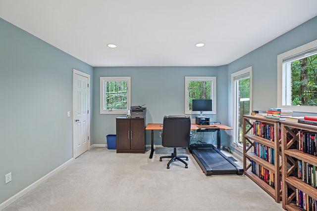 a room with furniture and a window