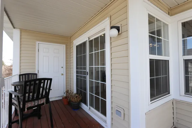 a view of balcony and wooden floor